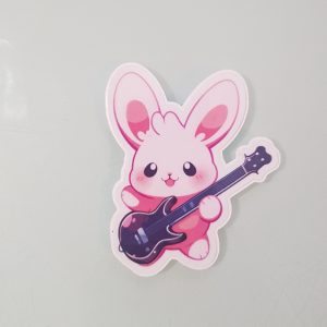 Sticker lapin mignon avec une guitare